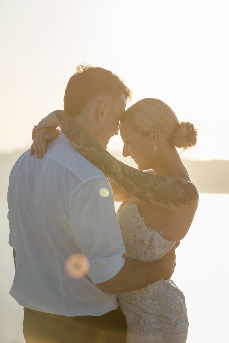 Romantic sunset photos during elopement in Santorini Greece